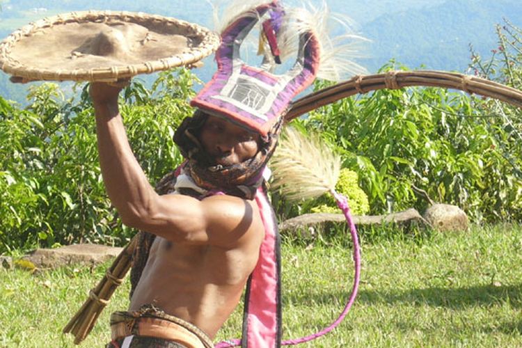 Caci dancer at Melo Cultural Village