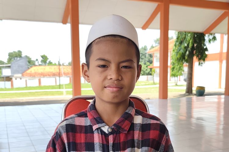 Muhammad Zainullah (10) adik dari Fitri Urbasari 