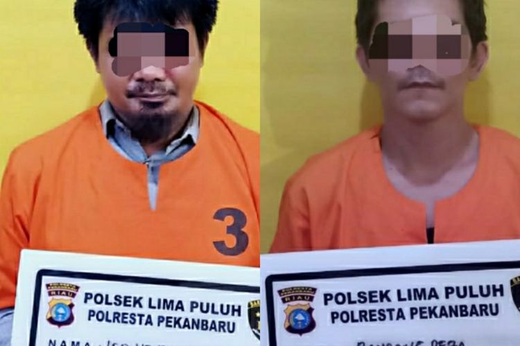 Oknum anggota Satpol PP Pekanbaru, Bambang Reza (38) dan rekannya, Leo Hendriyanto (40) saat diamankan di Polsek Limpuluh usai mencuri sepeda di SDN 82 Pekanbaru di Jalan Thamrin, Kecamatan Sail, Kota Pekanbaru, Riau, Senin (27/7/2020).