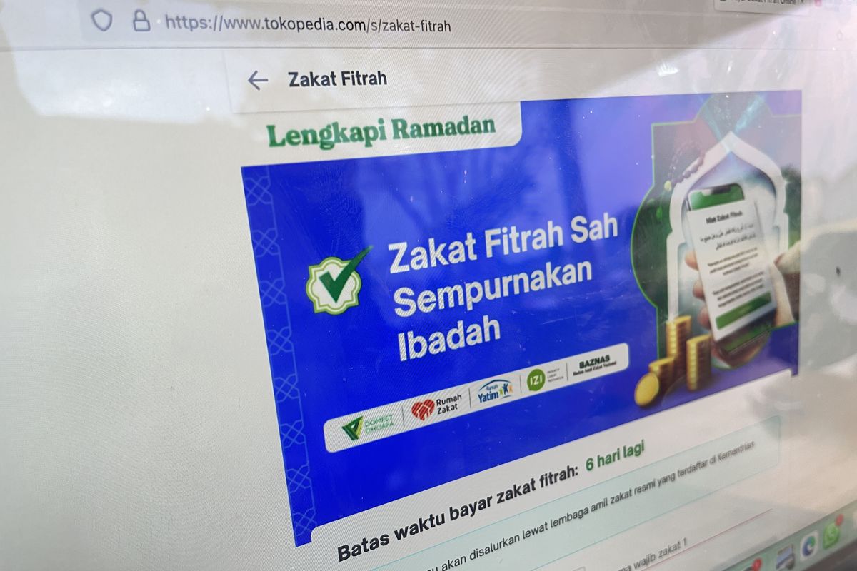 Ilustrasi cara bayar zakat fitrah online lewat Tokopedia.