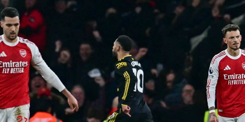 Ekspresi Mikel Merino di tengah momen selebrasi gol Matheus Cunha dalam pertandingan sepak bola Liga Inggris antara Arsenal vs Manchester United di Stadion Emirates di London pada 25 Januari 2026. (Foto oleh Ben STANSALL / AFP)