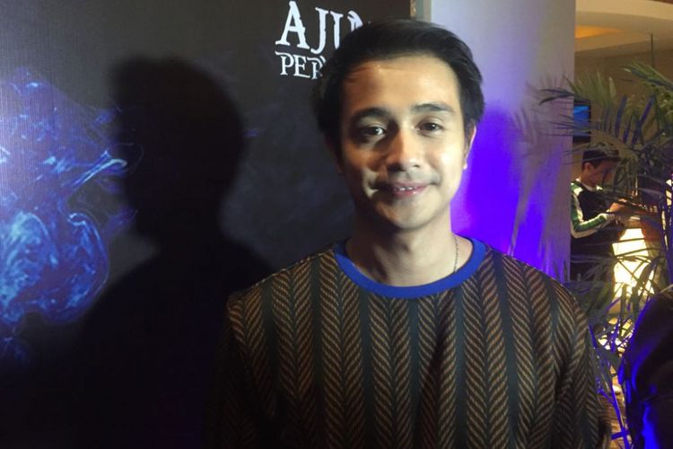 Ajun Perwira berpose ketika menghadiri premiere film Jaran Goyang, di Epicentrum XXI, Kuningan, Jakarta Selatan, Rabu (27/6/2018)