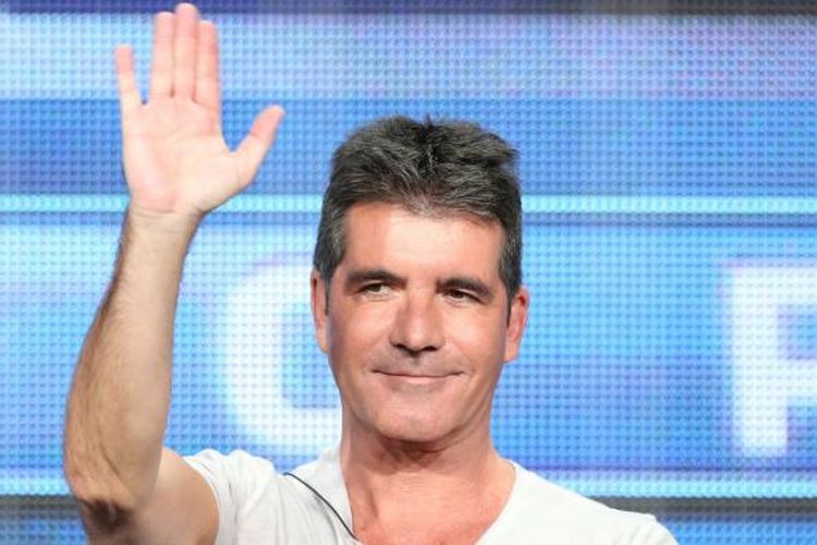 Simon Cowell berbicara di panggung dalam diskusi panel ?The X Factor? sebagai bagian dari perbincangan mengenai tayangan-tayangan FOX pada hari kesembilan tur 2013 Summer Television Critics Association di The Beverly Hilton Hotel, Beverly Hills (California, AS), 1 Agustus 2013.