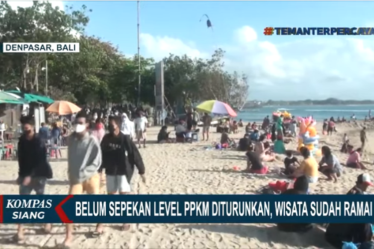 Tangkapan layar siaran Kompas TV, Senin (20/9/2021). Belum sepekan level PPKM diturunkan, wisatawan ramai mengunjungi pantai di Bali pada Minggu (19/9/2021).