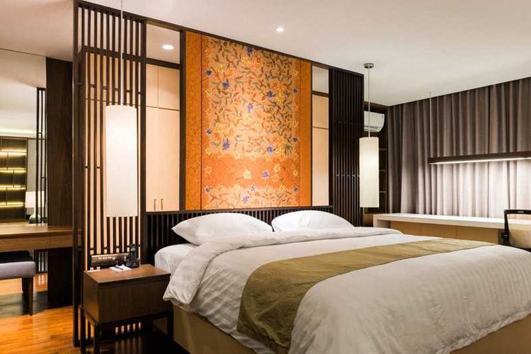 Desain interior kamar tidur warna orange karya PT. Garis Prada 