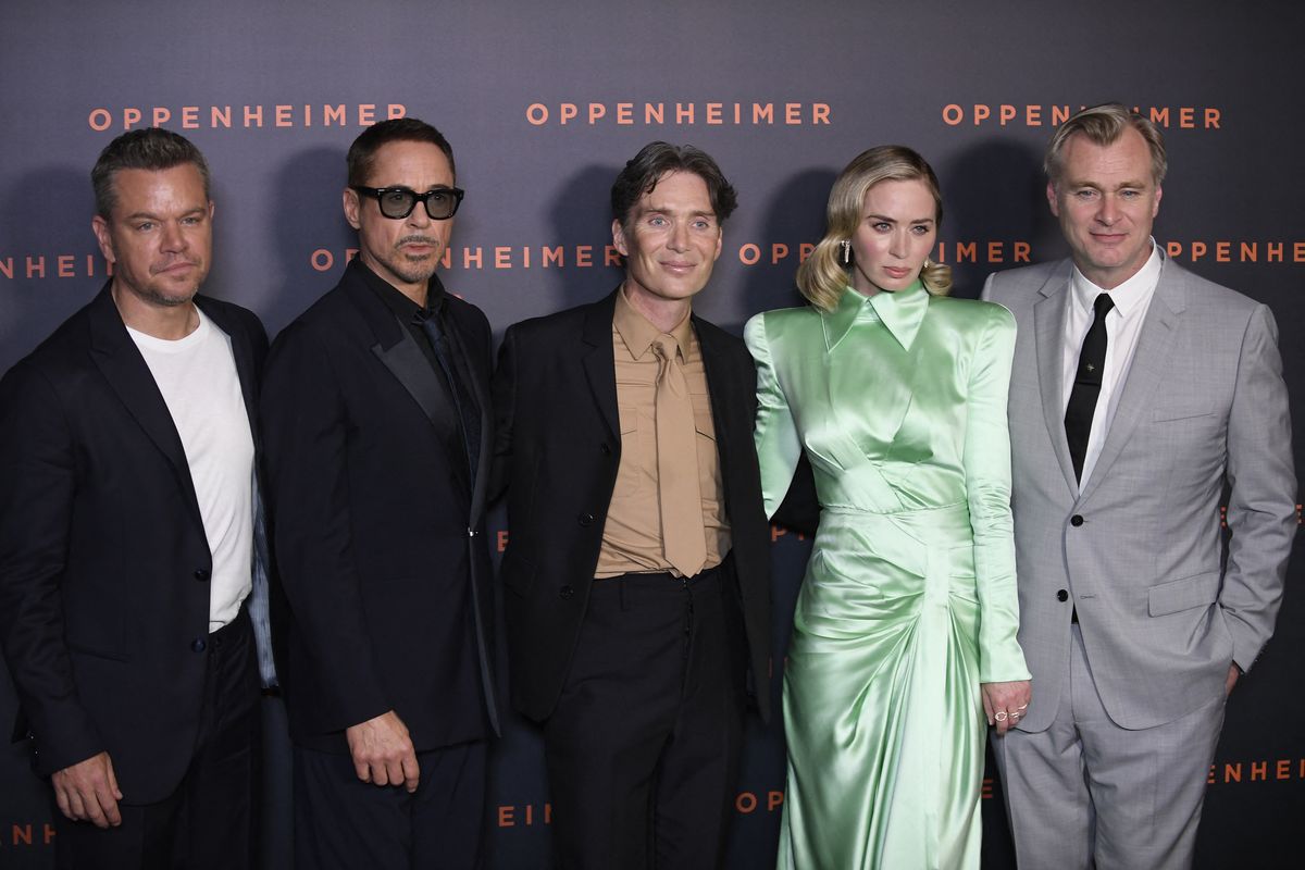(LtoR) US actors Matt Damon and Robert Downey Jr., Irish actor Cillian Murphy, US-British actress Emily Blunt and US-British film director Christopher Nolan pose upon their arrival for the Premiere of the movie Oppenheimer at the Grand Rex cinema in Paris on July 11, 2023. (Photo by JULIEN DE ROSA / AFP)