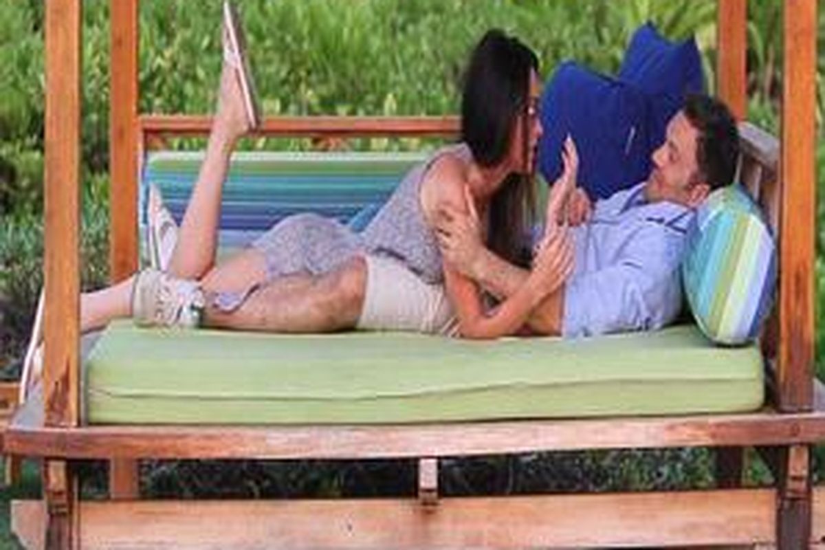 The look of love: The couple look relaxed and happy together following their low-key ceremony  