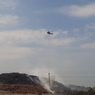 Padamkan Kebakaran TPA Putri Cempo, Helikopter Super Puma BNPB Ambil Air dari Sungai Bengawan Solo