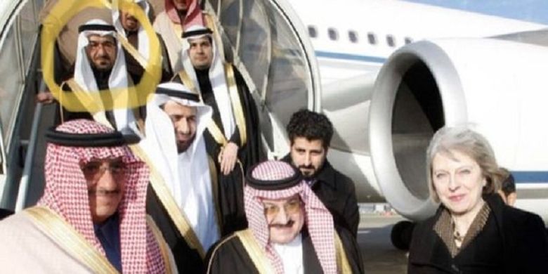 Saad al-Jabri (dilingkari) dan rombongan Arab Saudi lainnya ketika diterima Menteri Dalam Negeri Inggris, Theresa May, dalam kunjungan ke London pada 2015. Dr al-Jabri kini menghadapi persekusi setelah mengasingkan diri ke Kanada.