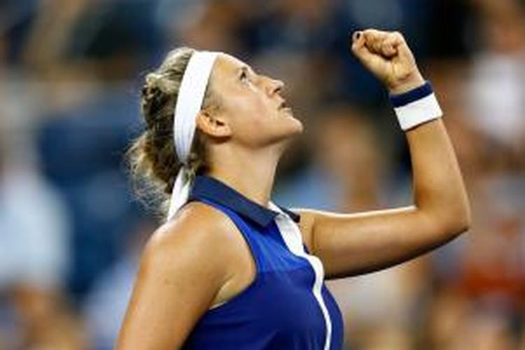 Petenis Belarus, Victoria Azarenka, bereaksi setelah meraih poin atas petenis Serbia, Aleksandra Krunic, pada babak keempat AS Terbuka di USTA Billie Jean King National Tennis Center, New York, Senin (1/9/2014).