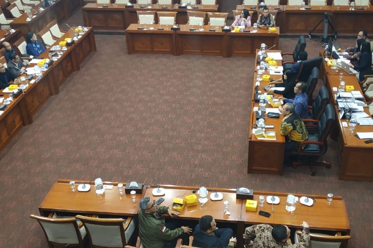 Indonesia's House of Representatives Commission I, which oversees security and foreign affairs, holds a meeting at the Parliament building in Jakarta on February 25, 2020. 