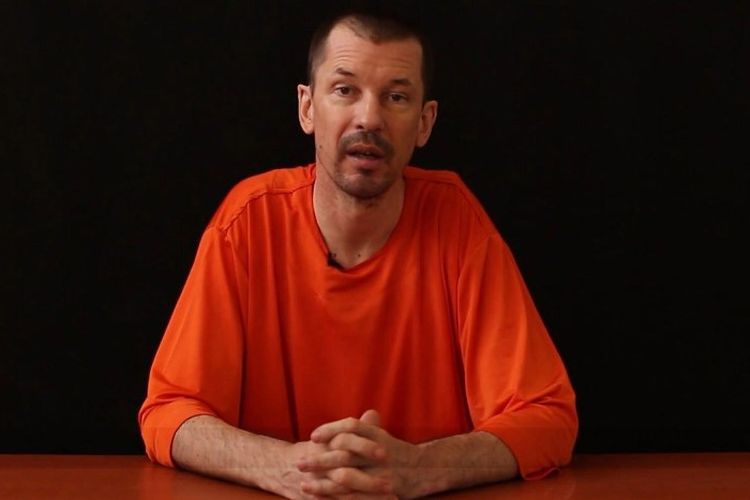 Fotografer asal Inggris, John Cantlie muncul dalam video propaganda yang dirilis ISIS pada 2014. (AFP via NBC News)