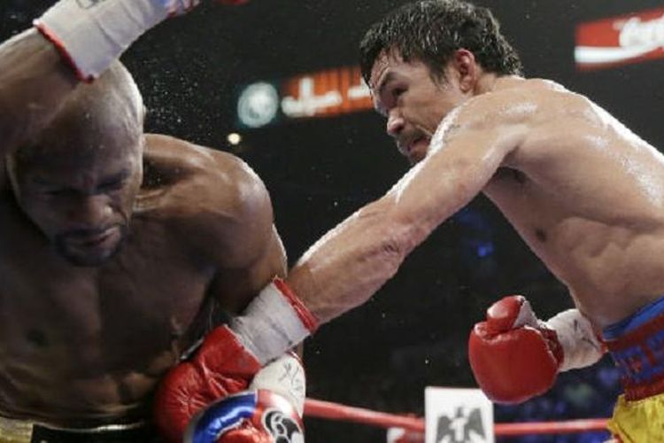 Manny Pacquiao (kanan) vs Floyd Mayweather Jr