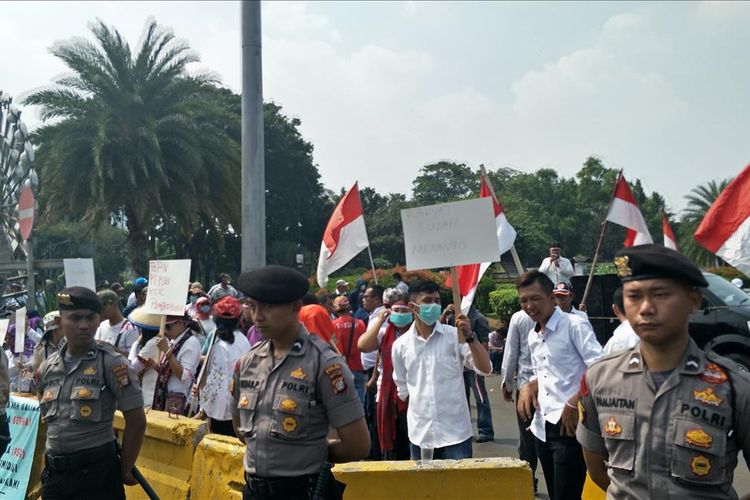 Aksi Demo di Istana Negara, Jalan Merdeka Barat,  Rabu (24/7/2019).