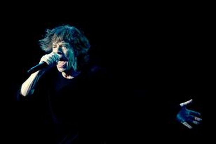 Mick Jagger, vokalis Rolling Stones. Gambar diambil saat dia tampil dalam konsernya di China pada 12 Maret 2014.