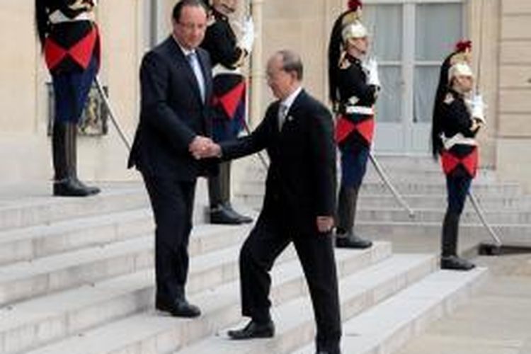 Presiden Perancis Francois Hollande dan Presiden Myanmar Thein Sein bertemu di Paris.