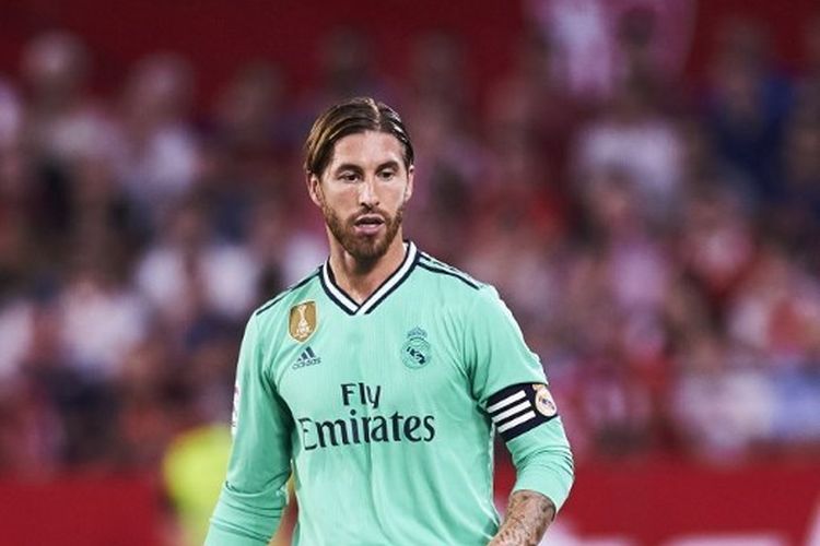 Kapten Real Madrid, Sergio Ramos, dalam pertandingan Liga Spanyol menghadapi Sevilla di Stadion Ramon Sanchez Pizjuan, 22 September 2019. (Photo by Aitor Alcalde/Getty Images)
AITOR ALCALDE / GETTY IMAGES EUROPE / Getty Images/AFP