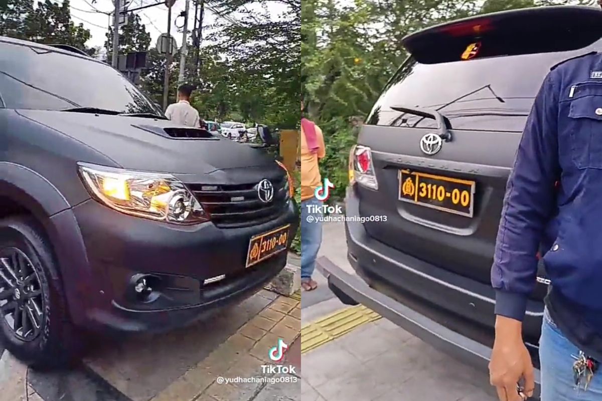 Kolase bidik layar video Toyota Fortuner berplat dinas Polri yang menabrak pengemudi ojol usai menerobos lampu merah di Jakarta Timur, Senin (6/2/2023) sore.