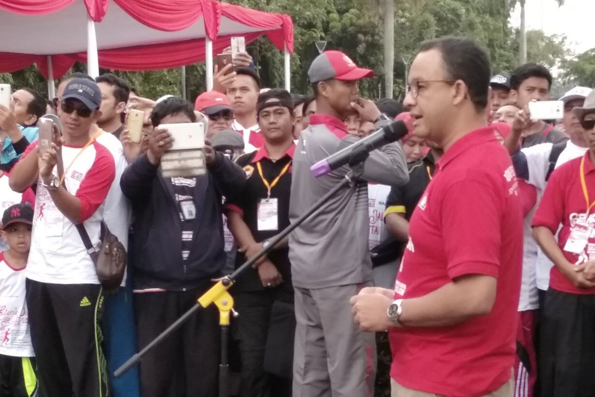 Gubernur DKI Jakarta Anies Baswedan di Monas, Minggu (25/3/2018)