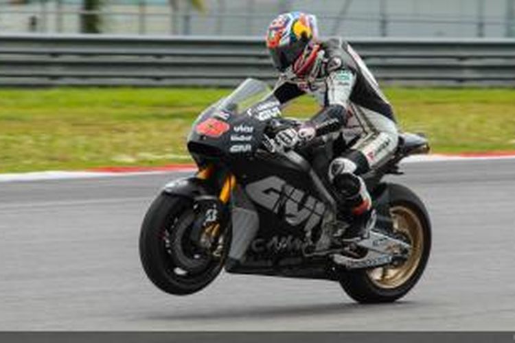 Pebalap LCR Honda asal Australia, Jack Miller, membalap di Sirkuit Sepang, Malaysia, pada sesi uji coba hari pertama, Rabu (4/2/2015).