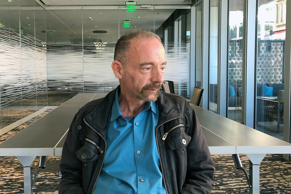 FILE - In this Monday, March 4, 2019 file photo, Timothy Ray Brown poses for a portrait in Seattle.  Brown, an American who was known for years as the Berlin patient, had a transplant in Germany from a donor with natural resistance to the AIDS virus. It was thought to have cured Browns leukemia and HIV. But in an interview Thursday, Sept. 24, 2020, Brown said his cancer returned last year and has spread widely. His case has inspired scientists to seek more practical ways to try to cure the disease.  (AP Photo/Manuel Valdes)