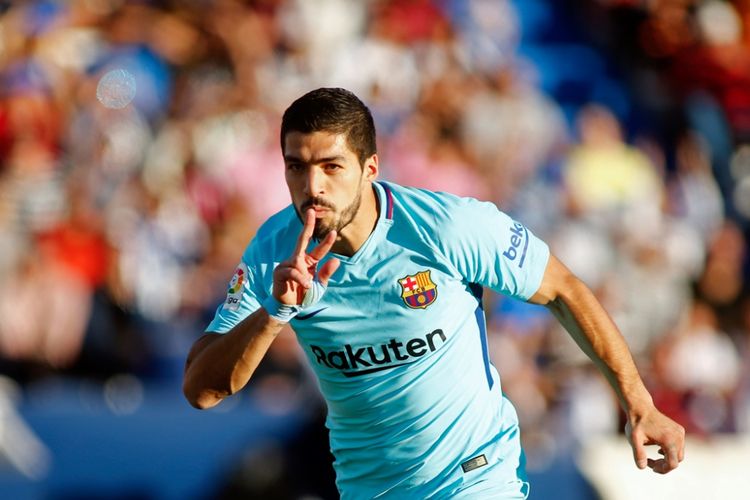 Luis Suarez merayakan gol Barcelona ke gawang Leganes pada laga Divisi Primera La Liga, kasta pertama Liga Spanyol, di Stadion Butarque, Sabtu (18/11/2017).