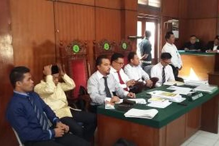 Kuasa hukum pengurus Partai Golkar hasil Munas Bali, dalam sidang sengketa internal Golkar di Pengadilan Negeri Jakarta Utara, Senin (6/7/2015).