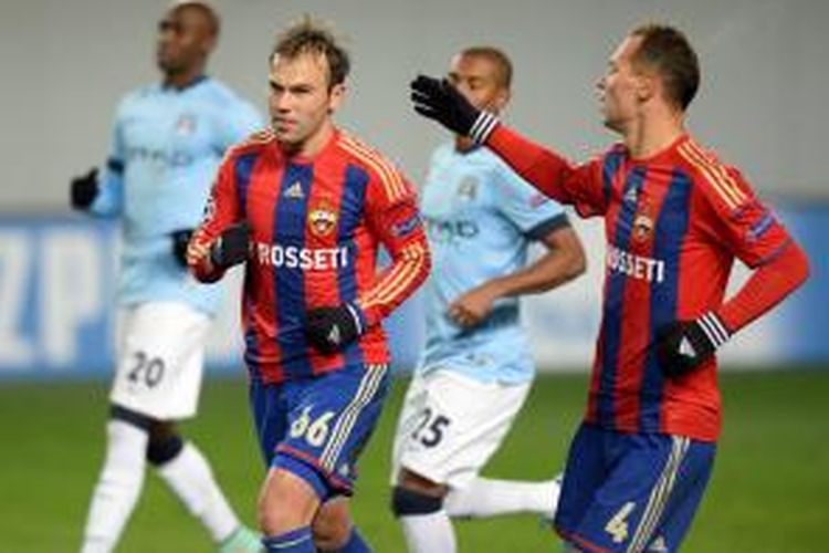 Gelandang CSKA Moskwa, Bebars Natcho, seusai mencetak gol ke gawang Manchester City pada lanjutan Liga Champions di Khimki Arena, Selasa (21/10/2014). 