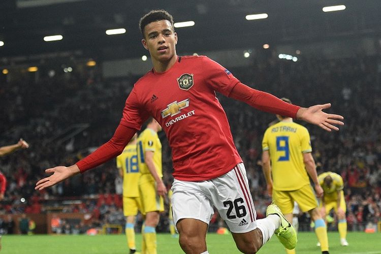 Striker Manchester United, Mason Greenwood, berselebrasi setelah mencetak gol pembuka pertandingan Grup L Liga Europa antara Man United vs Astana di Old Trafford di Manchester, Inggris, pada 19 September 2019.