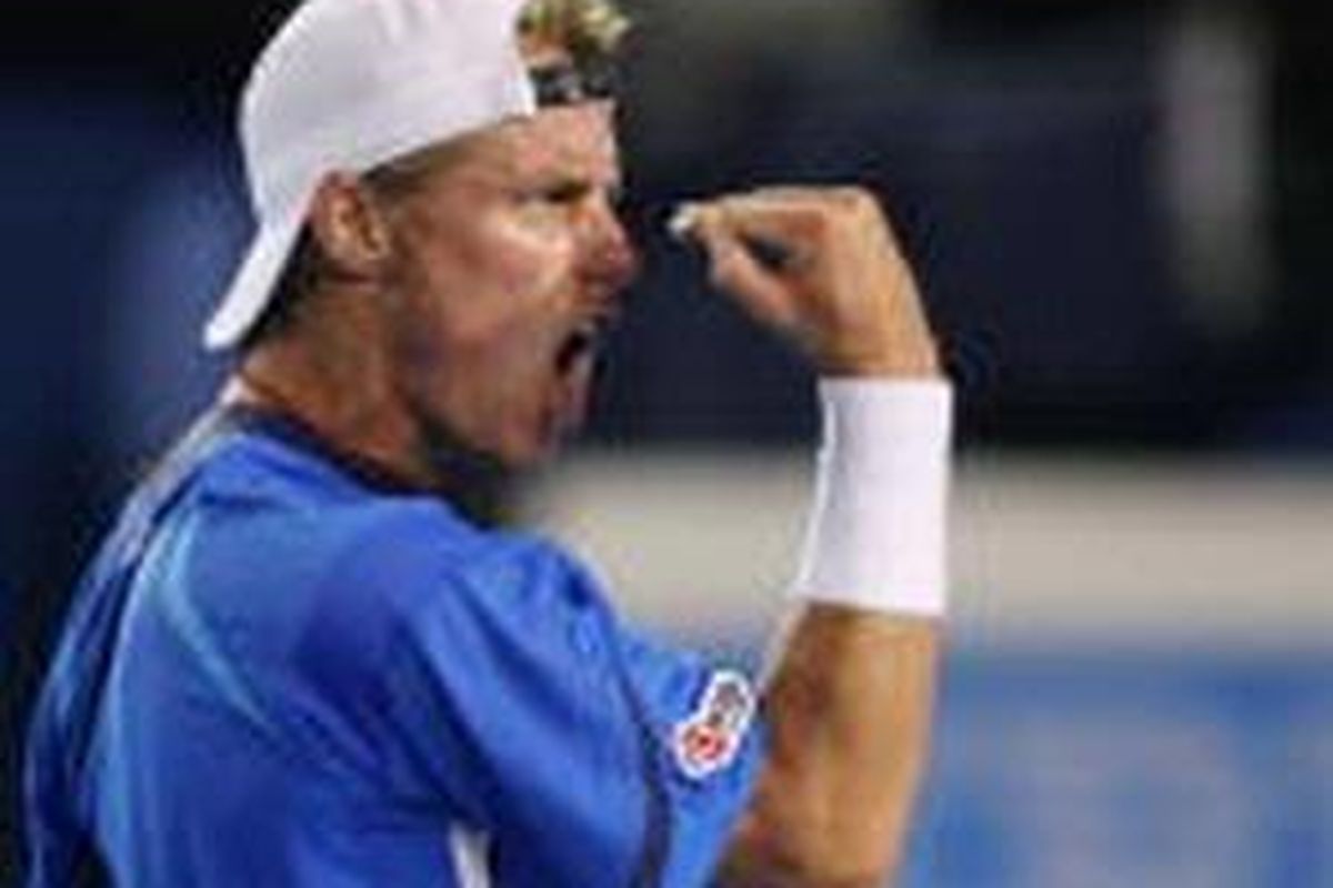 Lleyton Hewitt meluapkan kegembiraan setelah menaklukkan Marcos Baghdatis di babak ketiga Australia Terbuka