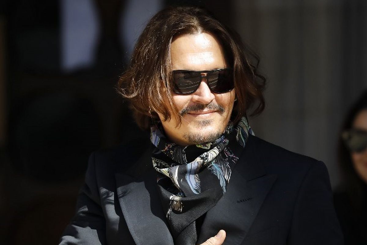 Aktor AS Johnny Deppmenghadiri persidangan pencemaran nama baik terhadap News Group Newspapers (NGN), di Pengadilan Tinggi di London, pada 20 Juli 2020. - Depp menggugat penerbit The Sun dan penulis artikel atas klaim yang menyebut dirinya sebagai pemukul istri pada April 2018. 