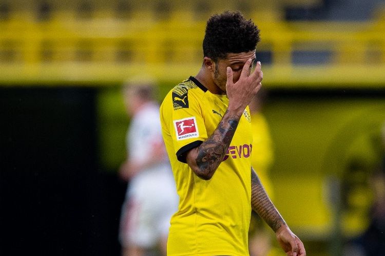 Reaksi Jadon Sancho setelah Borussia Dortmund menderita kekalahan kontra Mainz di ajang Bundesliga pada Kamis (18/6/2020) dini hari WIB.