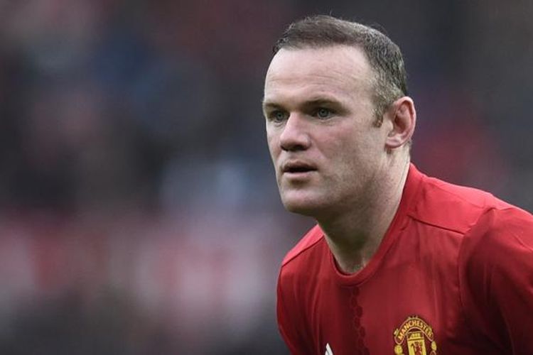 Ekspresi striker Manchester United, Wayne Rooney, ketika melawan Reading pada partai babak ketiga Piala FA di Stadion Old Trafford, Sabtu (7/1/2017). 
