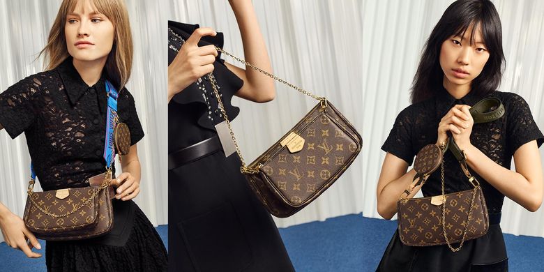 Model membawa tas Louis Vuitton Multi Pochette