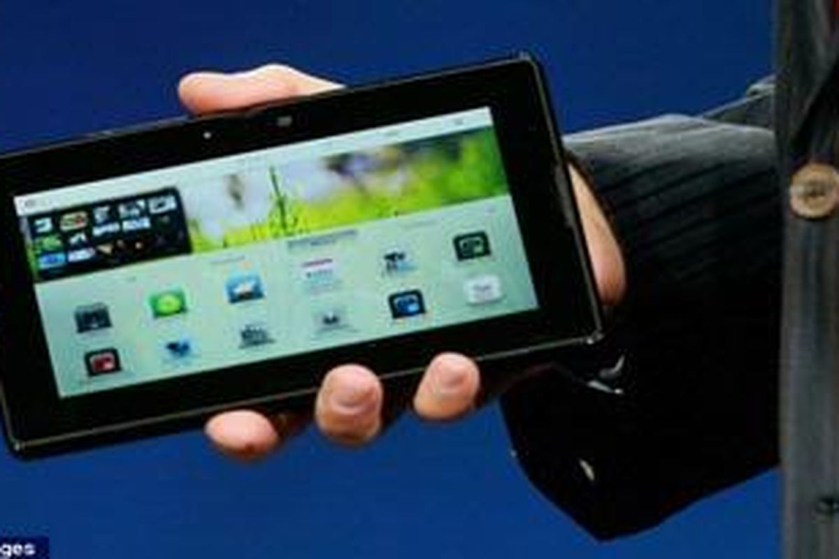 RIM boss Mike Lazaridis announces the new BlackBerry PlayBook as he delivers a keynote address at the BlackberryDevCon 2010 last night 