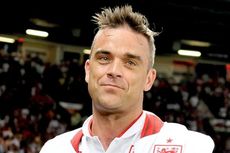 Jalani Masa Pemulihan dari Covid-19, Robbie Williams Jalan Kaki 10.000 Langkah Sehari