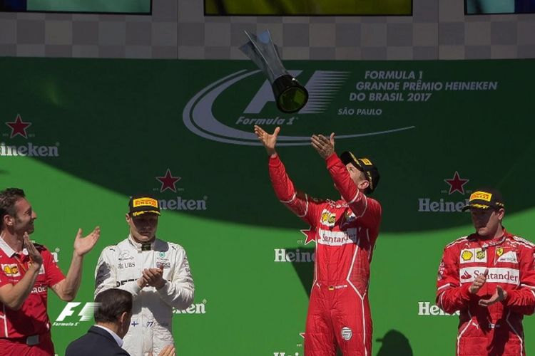 Sebastian Vettel memenangi GP Brasil setelah mengungguli Valtteri Bottas dan Kimi Raikkonen di Sao Paulo, Minggu (12/11/2017).