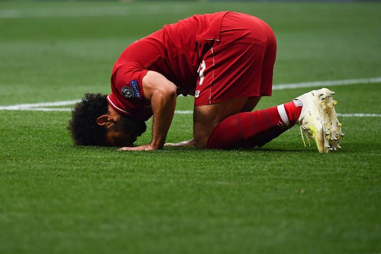 Mohamed Salah melakukan selebrasi usai mencetak gol penalti pada laga Tottenham Vs Liverpool, di Stadion Wanda Metropolitano, Madrid, Spanyol, Sabtu (1/6/2019).