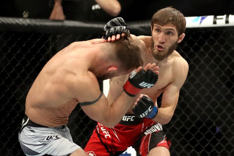 ANAHEIM, CALIFORNIA - JANUARY 22: Said Nurmagomedov of Russia (right) exchanges punches with Cody Stamann in their bantamweight fight during the UFC 270 event at Honda Center on January 22, 2022 in Anaheim, California.   Katelyn Mulcahy/Getty Images/AFP (Photo by Katelyn Mulcahy / GETTY IMAGES NORTH AMERICA / Getty Images via AFP)