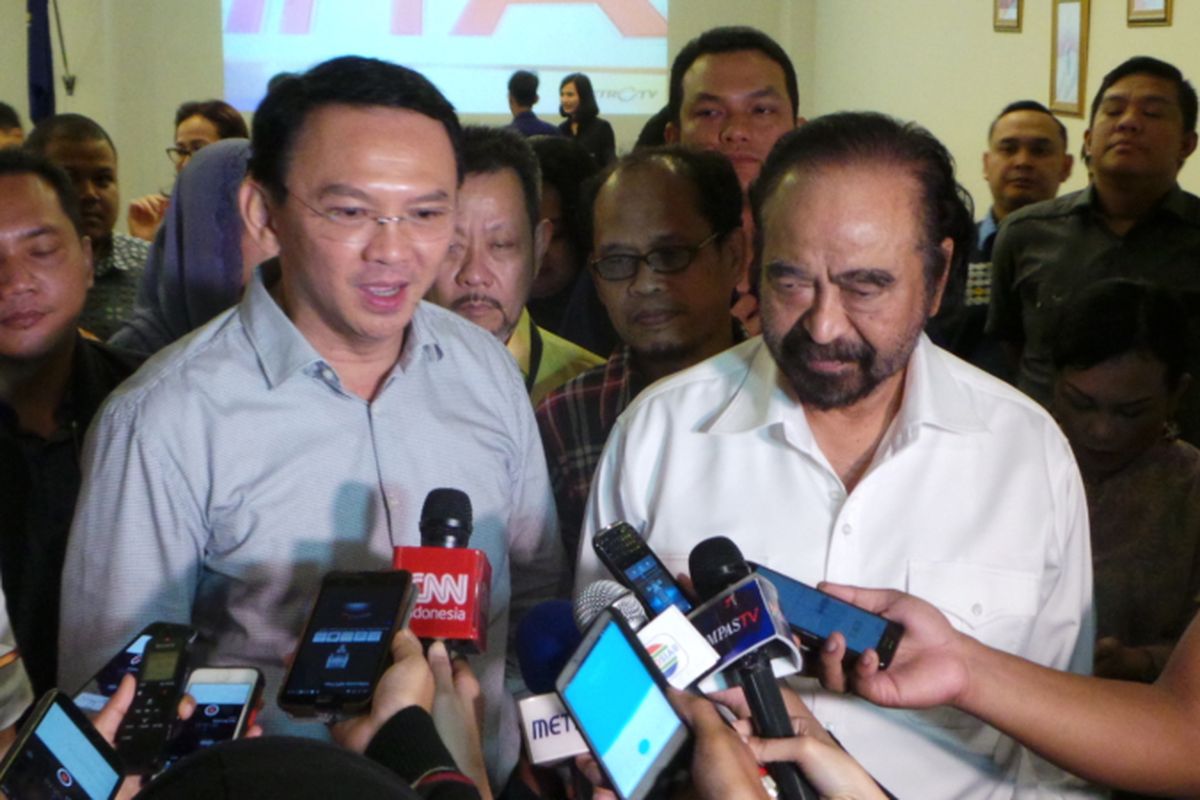Calon gubernur DKI Jakarta Basuki Tjahaja Purnama atau Ahok dan Ketua Umum Partai Nasdem Surya Paloh, di kantor DPP Nasdem, Rabu (19/4/2017). 