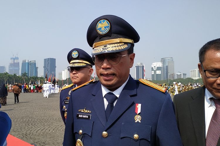 Menteri Perhubungan (Menhub) Budi Karya Sumadi memberikan keterangan seusai upacara pelantikan Perwira Transportasi di Lapangan Monas, Jakarta, Rabu (18/9/2019).