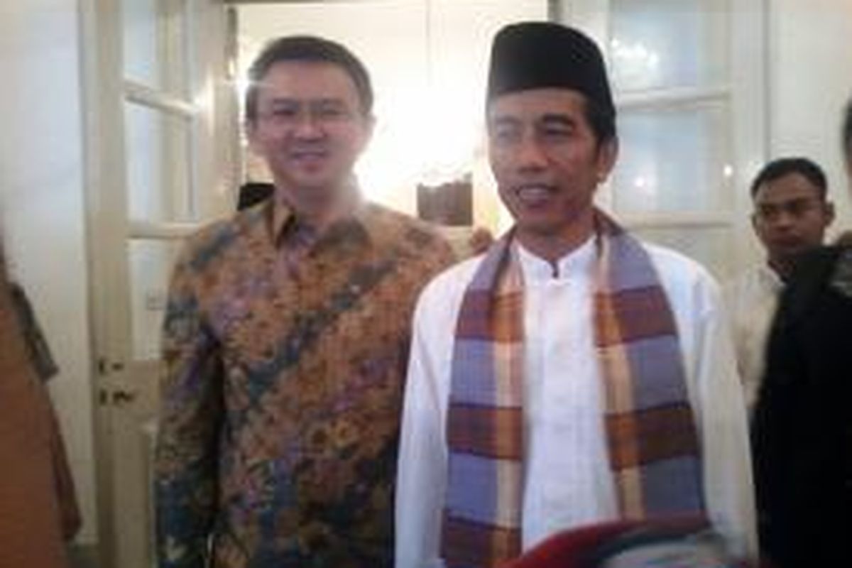 Gubernur DKI Jakarta Joko Widodo dan Wakil Gubernur Basuki Tjahja Purnama pada silaturahim Idul Fitri 1434 H di Balaikota, Kamis (8/8/2013).