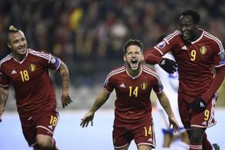 Dries Mertens merayakan gol ke gawang Israel dan memastikan Belgia lolos sebagai juara grup, Selasa (13/10/2015). 