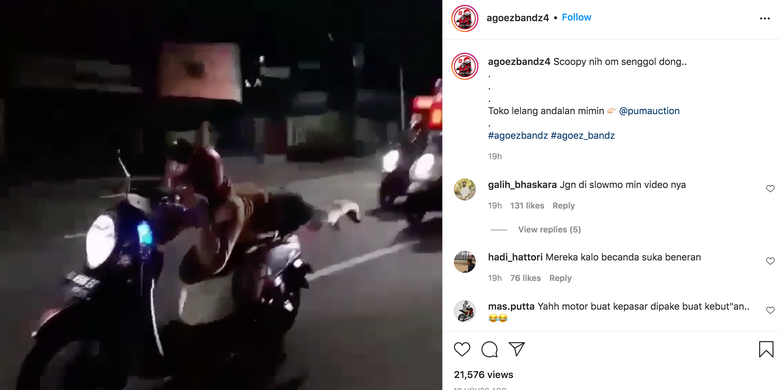 Pengendara motor berlagak ala Superman di jalan raya