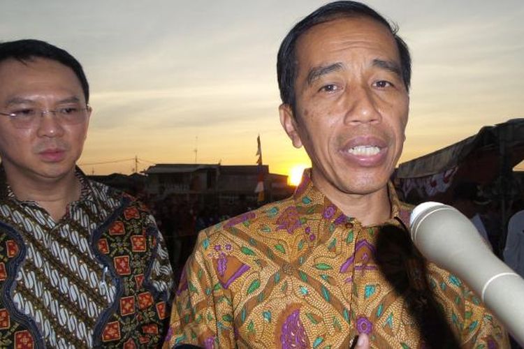 Presiden Joko Widodo dan Gubernur DKI Jakarta Basuki Tjahaja Purnama saat blusukan di kawasan Tanah Merah, Kamis (3/9/2015).