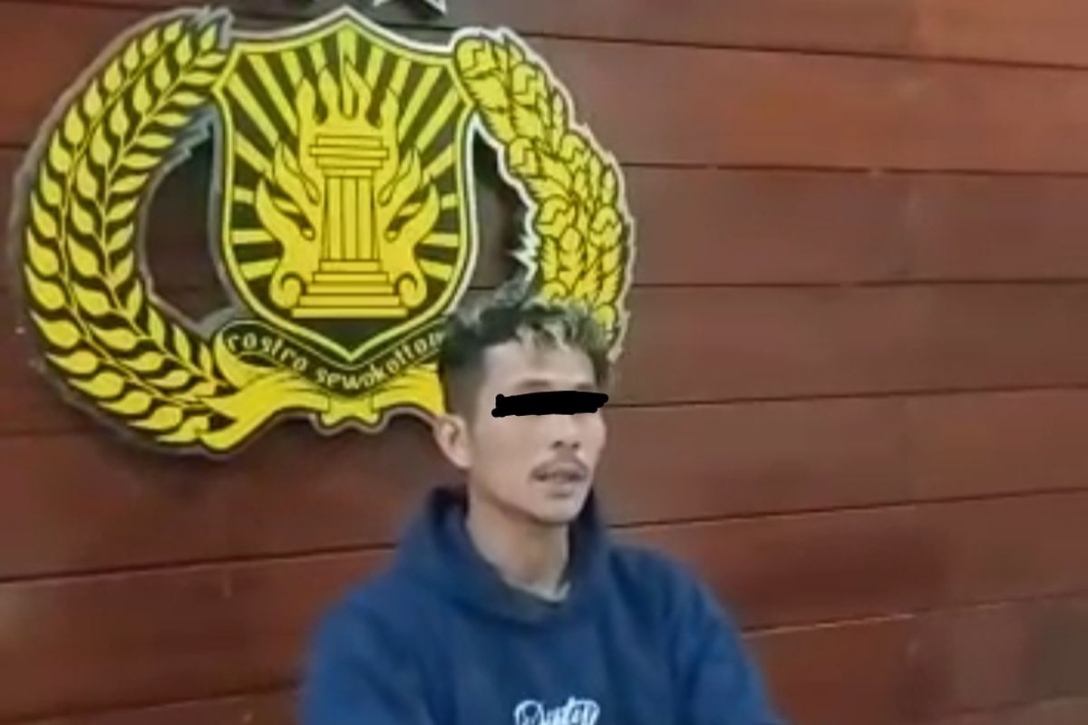 Tangkapan layar pelaku permintaan maaf pelaku di Mapolsek Kuta Selatan terkait kasus penembakan anjing pakai senapan angin hingga tewas di sebuah perumahan di Jimbaran, Kecamatan Kuta Selatan, Kabupaten Badung, Bali, pada Jumat (25/12/2022) sekitar pukul 15.30 Wita. /Istimewa