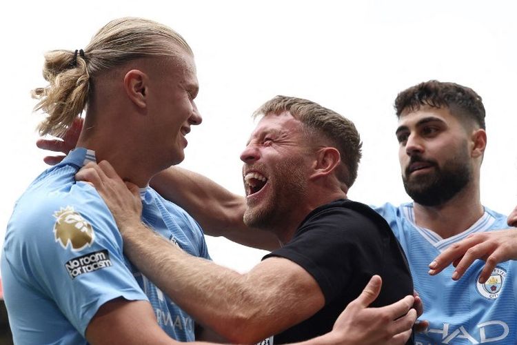 Erling Haaland kala melakukan selebrasi usai membuat gol dalam laga Liga Inggris antara Sheffield United vs Man City di Bramall Lane, 27 Agustus 2023. (Photo by Darren Staples / AFP) 