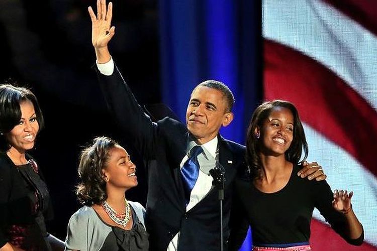 Presiden AS, Barack Obama, dan istrinya Michelle serta kedua putri mereka, Malia (14 tahun) dan Sasha (11).