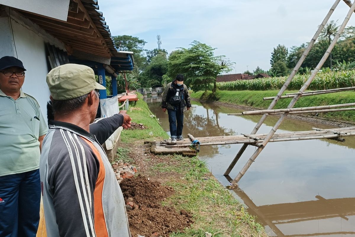 Sungai Molek, lokasi penemuan mayat yang diduga menjadi korban pembunuhan, Senin (13/6/2022).