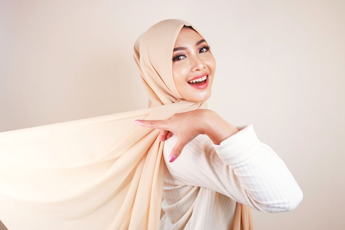 Ilustrasi perempuan menggunakan hijab.